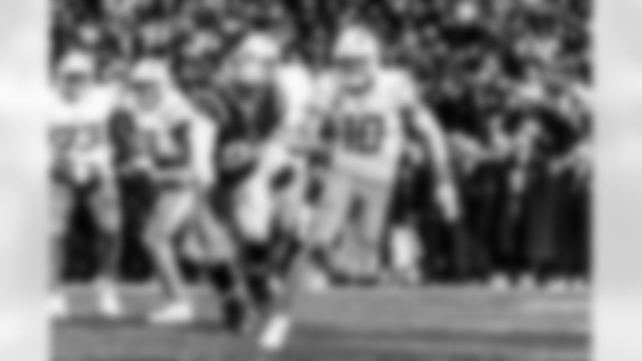 Take a look back at the Chargers Wild Card matchup with the Patriots in monochrome.