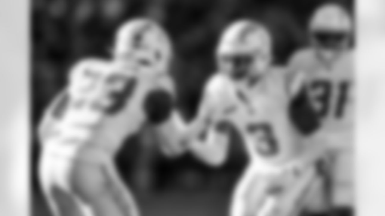 S Tony Jefferson (23) and S Derwin James Jr. (3)