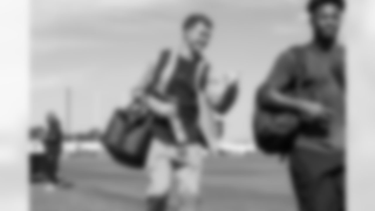 WR Ladd McConkey (15) and RB Kimani Vidal (30)