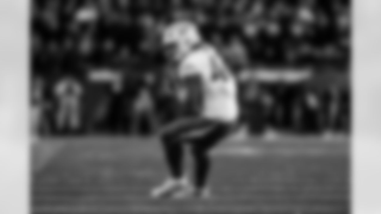 Check out the best shots from the Chargers Wild Card matchup against the Patriots!