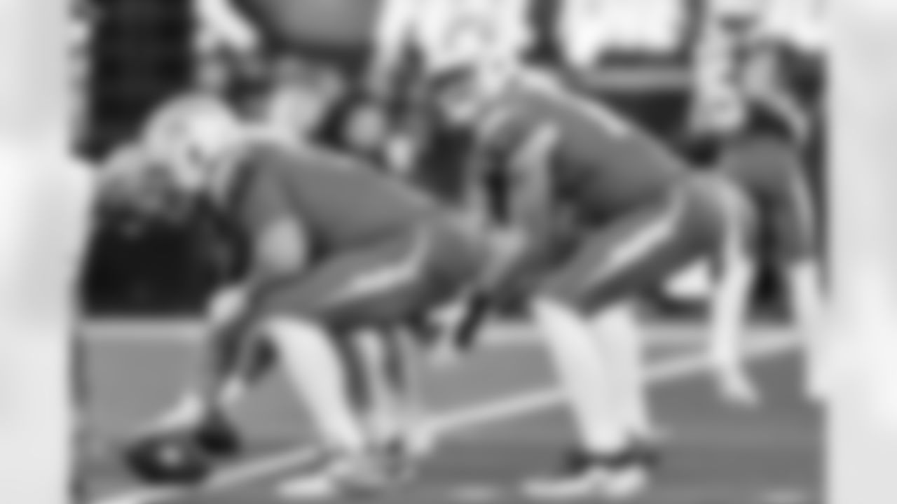 C Bradley Bozeman (75) and QB Justin Herbert (10)