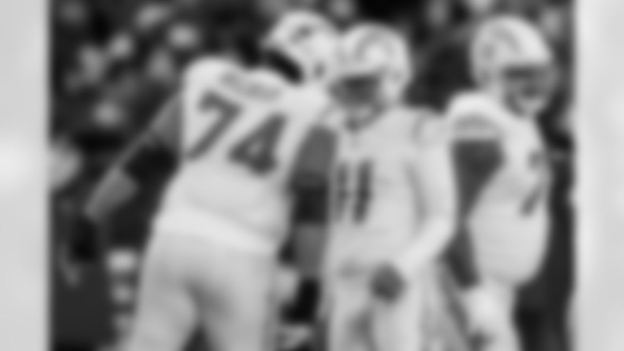 OL Austin Deculus (74) and K Cameron Dicker (11)