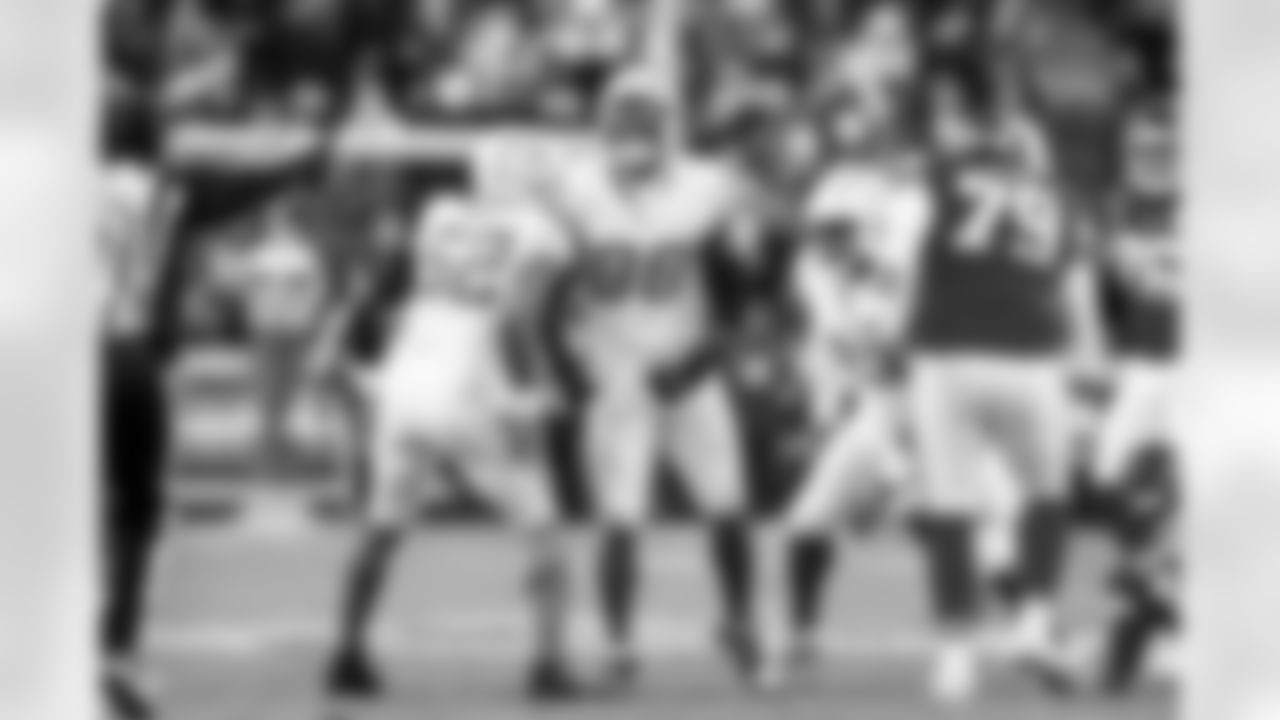 OLB Khalil Mack (52) and OLB Odafe Oweh (98)