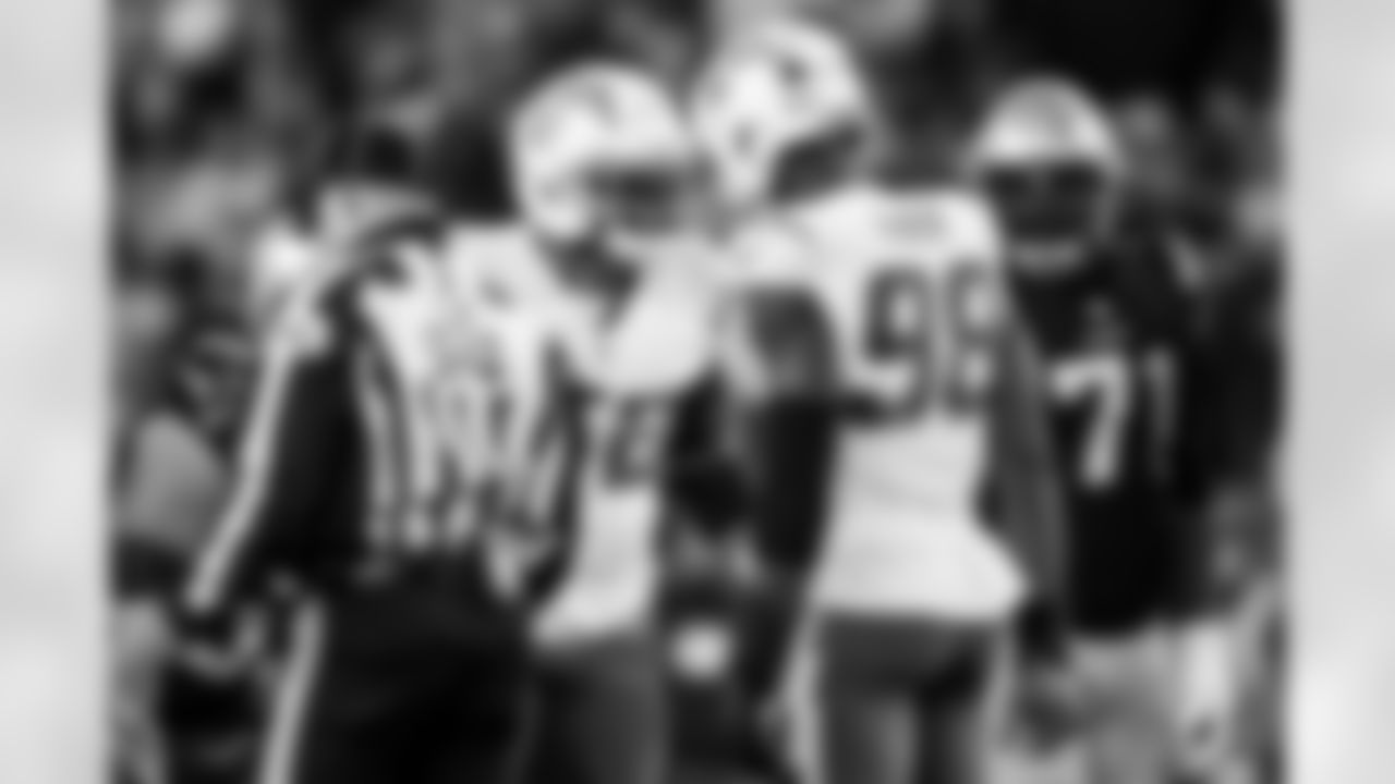 OLB Khalil Mack (52) and OLB Odafe Oweh (98)