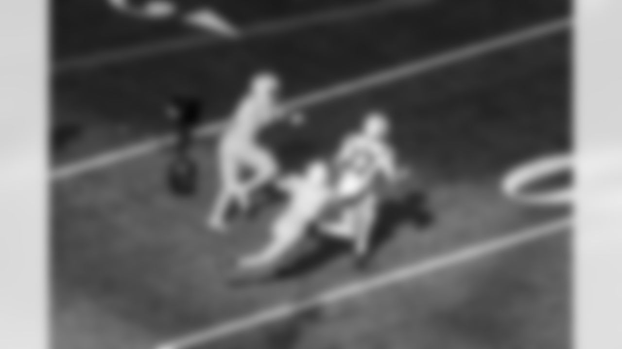 DL Justin Eboigbe (92) and CB Tarheeb Still (29)
