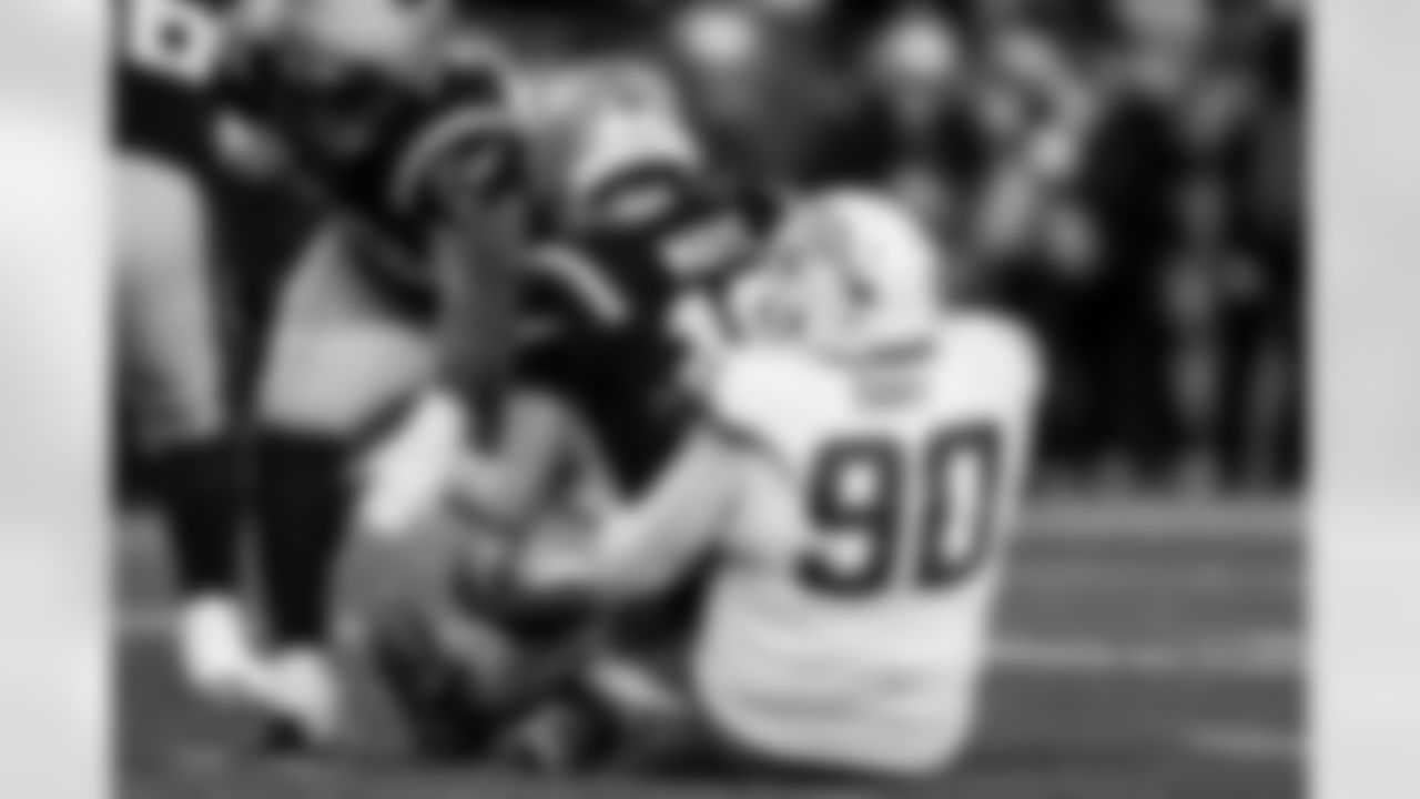 Check out the best shots from the Chargers Wild Card matchup against the Patriots!