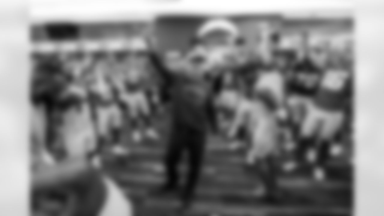 WR Ladd McConkey (15), Head Coach Jim Harbaugh, C Bradley Bozeman (75), S Derwin James Jr. (3) and QB Justin Herbert (10)