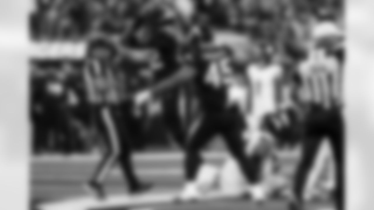 DL Justin Eboigbe (92) and OLB Tuli Tuipulotu (45)