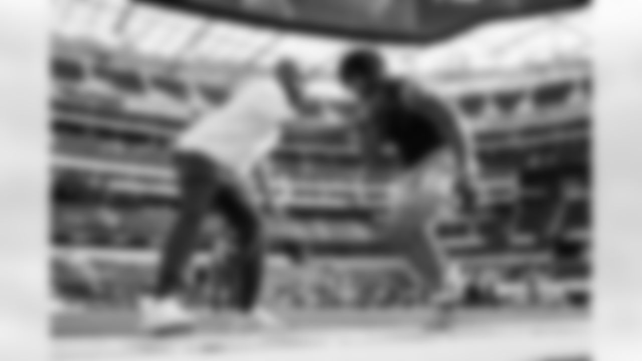 Running Backs Coach Kiel McDonald and RB Omarion Hampton (8)