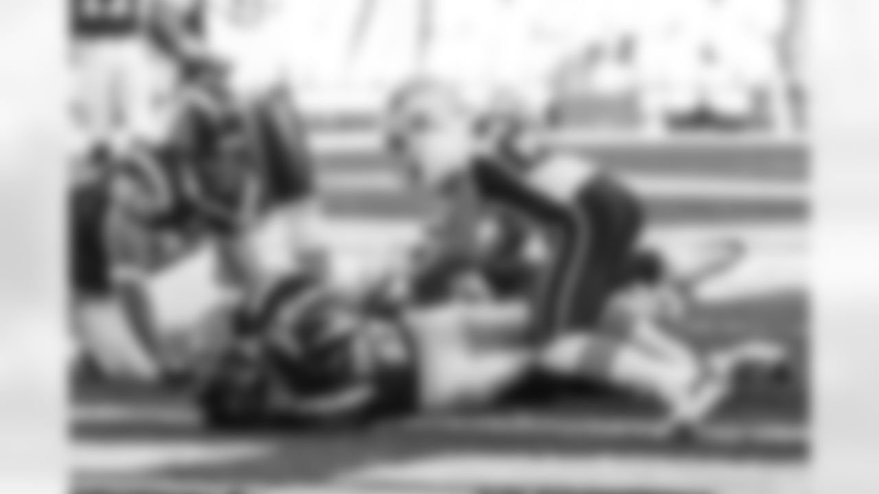 Relive the Chargers' postseason appearances through images from playoff games, highlighting the moments that defined the team in the NFL playoffs.