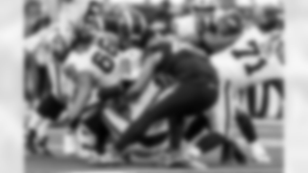 OLB Khalil Mack (52) and OLB Tuli Tuipulotu (45)