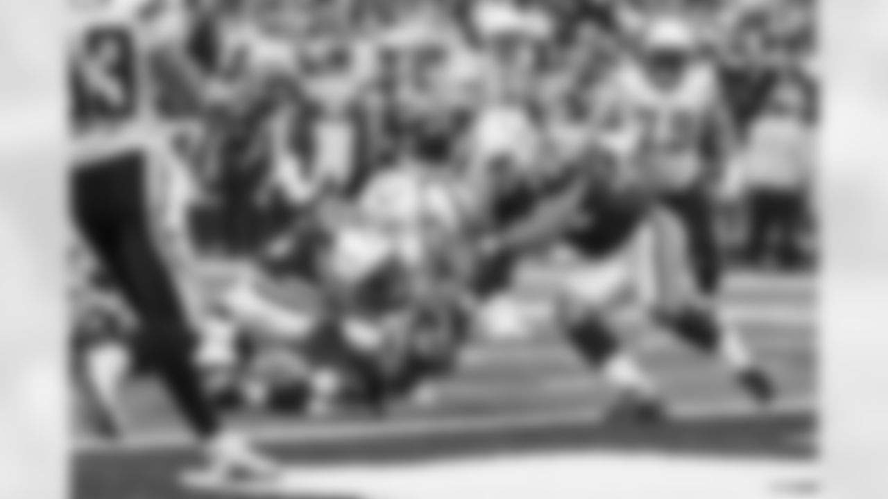 Relive the Chargers' postseason appearances through images from playoff games, highlighting the moments that defined the team in the NFL playoffs.