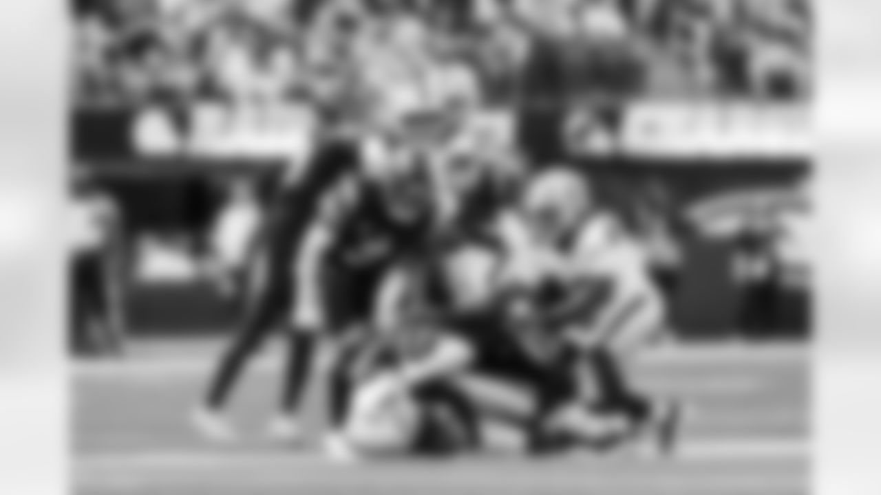 S Derwin James Jr. (3) and LB Daiyan Henley (0)