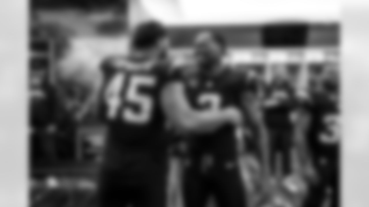 OLB Tuli Tuipulotu (45) and S Derwin James Jr. (3)