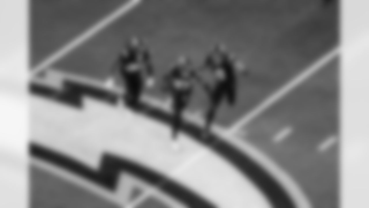 S RJ Mickens (27), DB Ja'Sir Taylor (36) and LB Daiyan Henley (0)