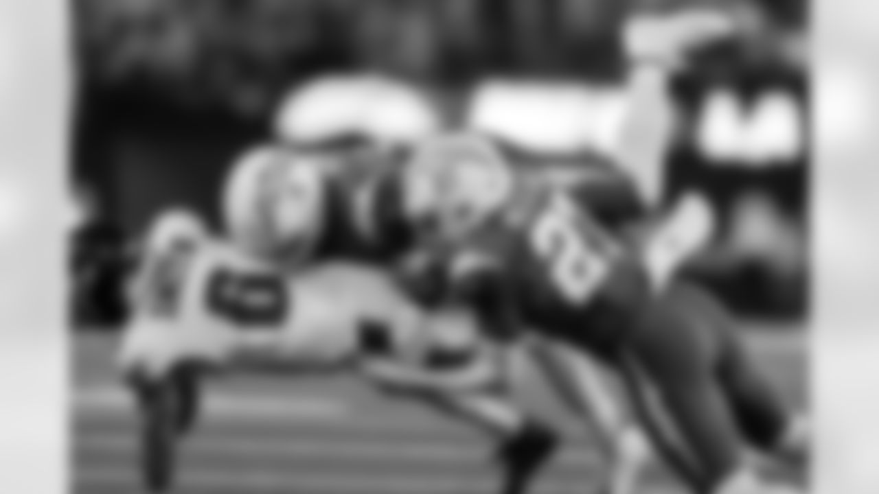 S RJ Mickens (27) and LB Denzel Perryman (6)