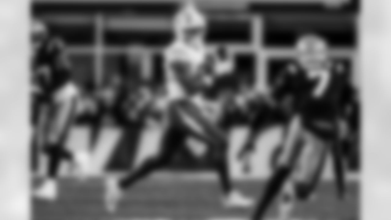 Check out the best shots from the Chargers Wild Card matchup against the Patriots!