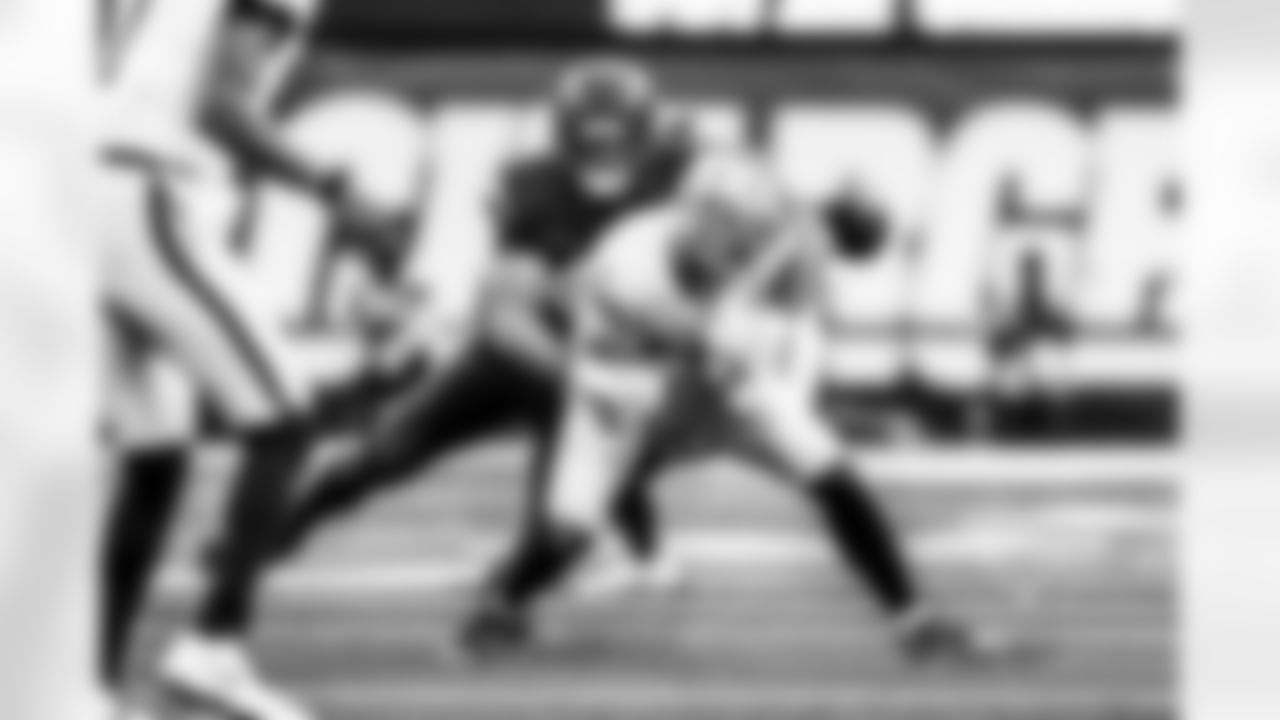 Take a look back at the Chargers Week 13 matchup with the Raiders in monochrome.