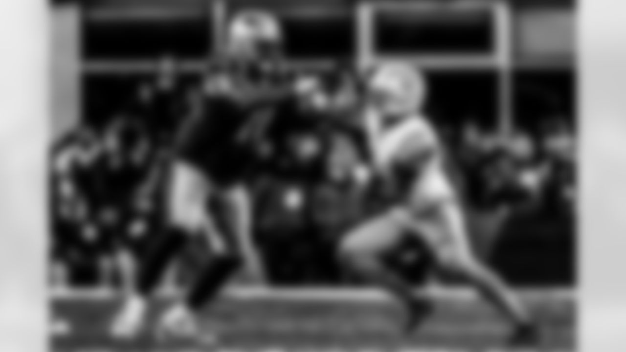 Take a look back at the Chargers Wild Card matchup with the Patriots in monochrome.