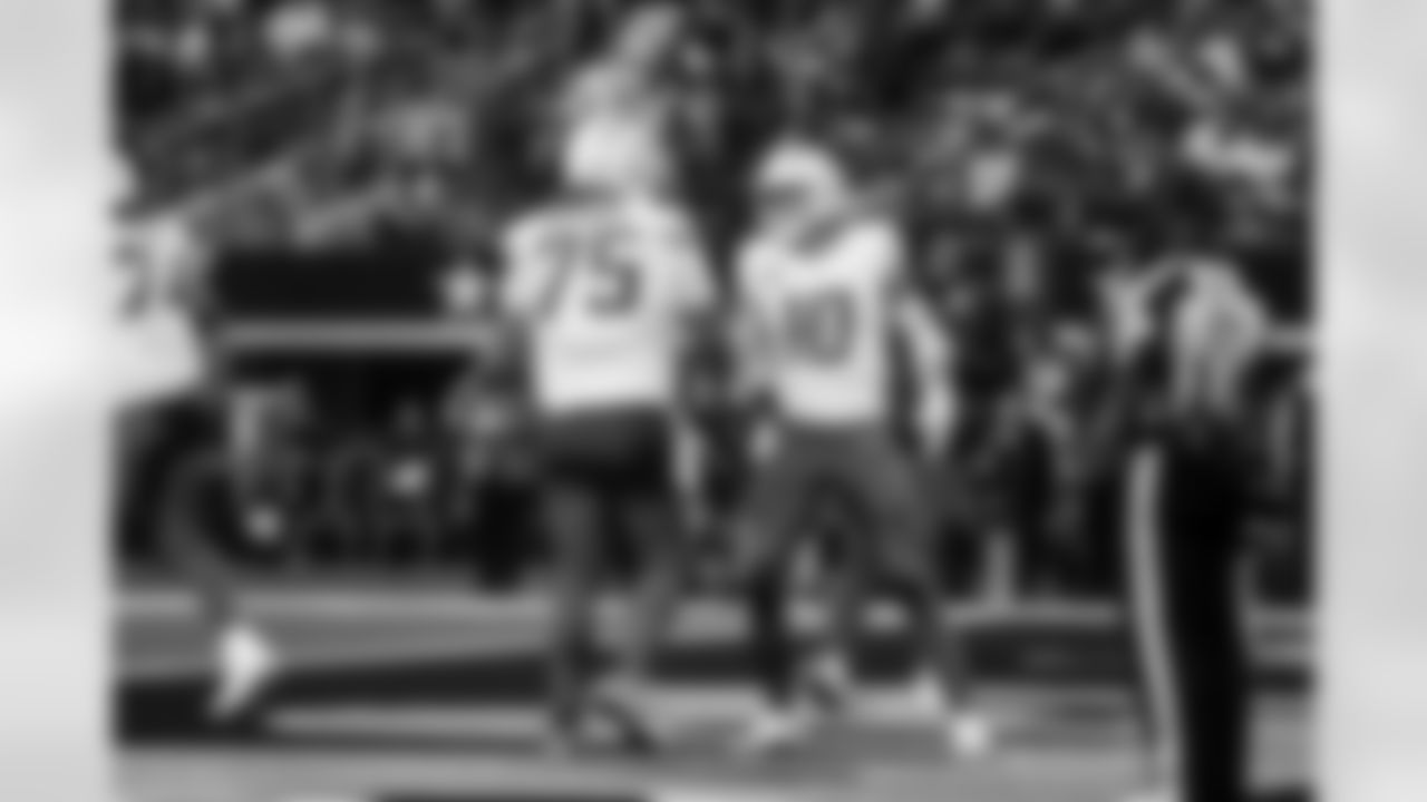 C Bradley Bozeman (75) and QB Justin Herbert (10)