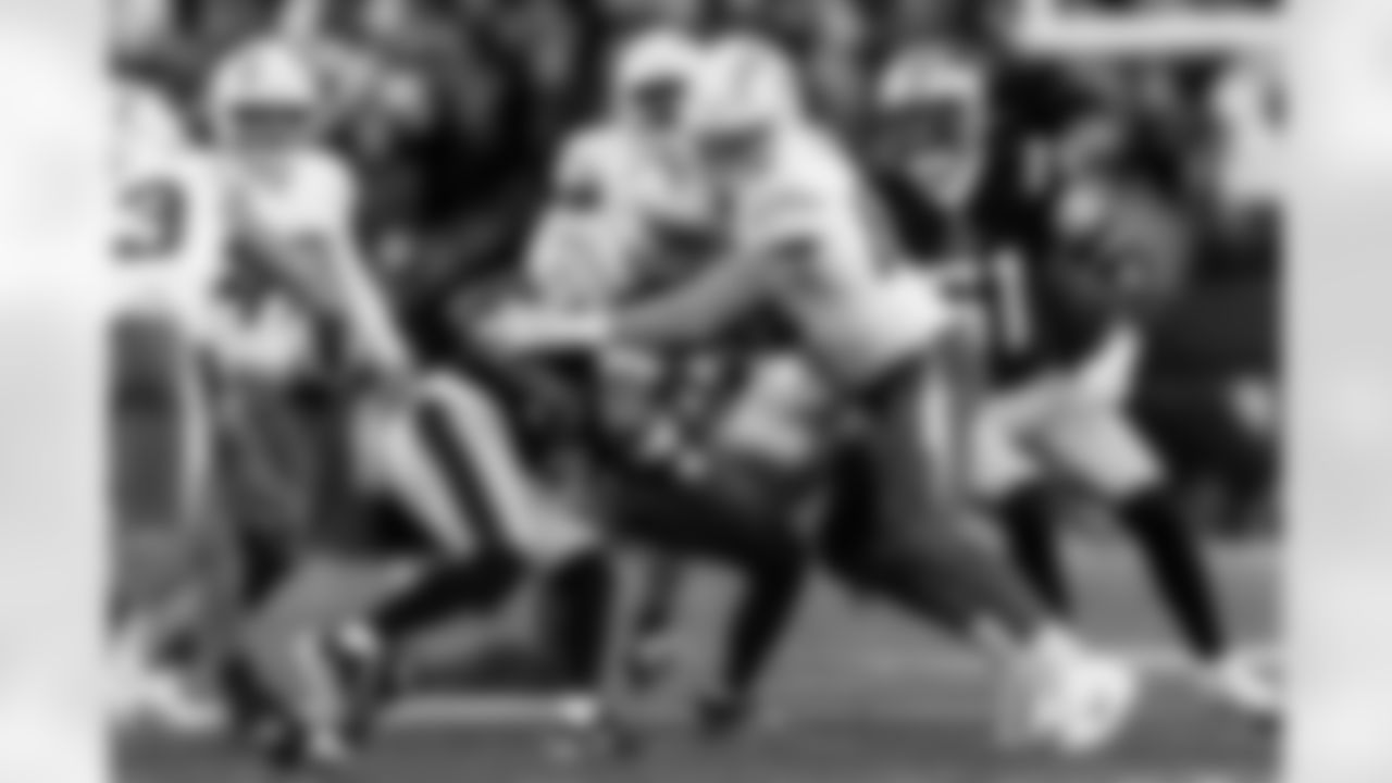 Check out the best shots from the Chargers Wild Card matchup against the Patriots!