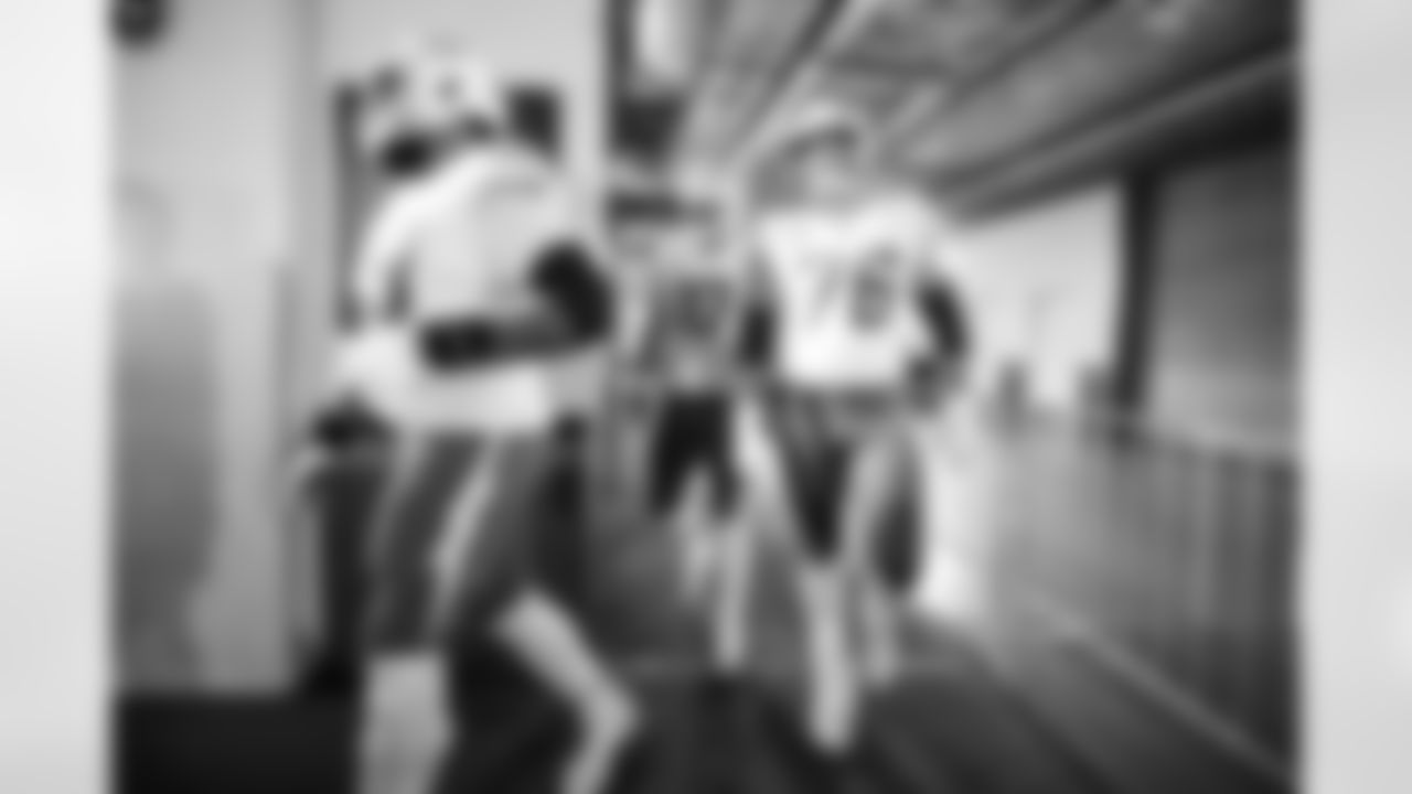 QB Justin Herbert (10) and T Joe Alt (76)