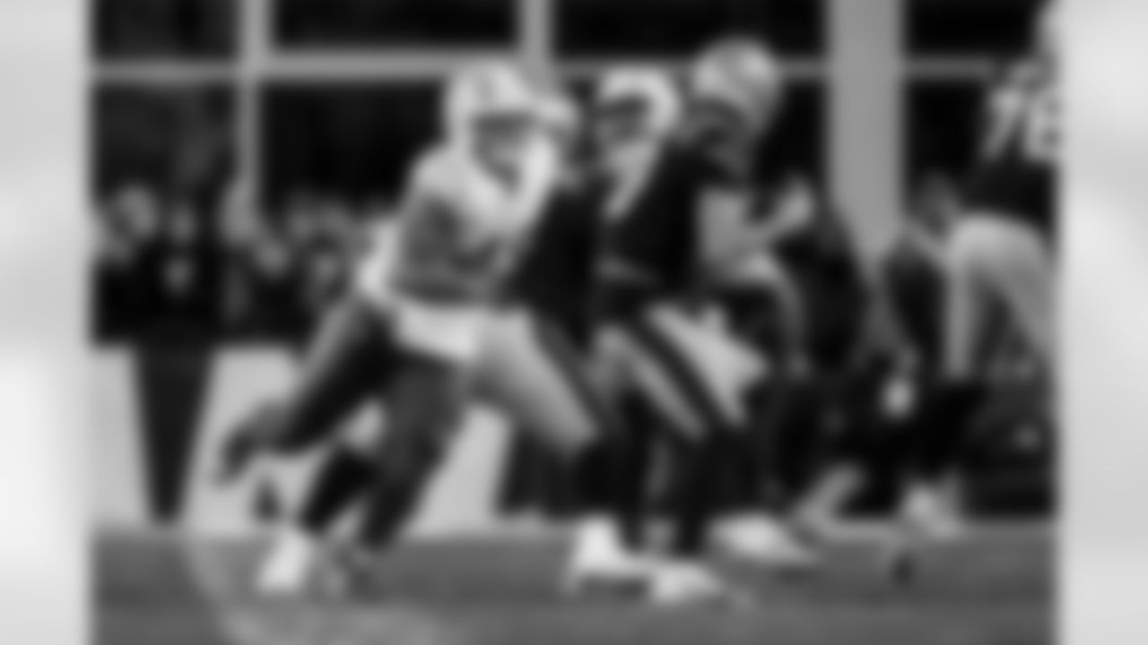 Check out the best shots from the Chargers Wild Card matchup against the Patriots!