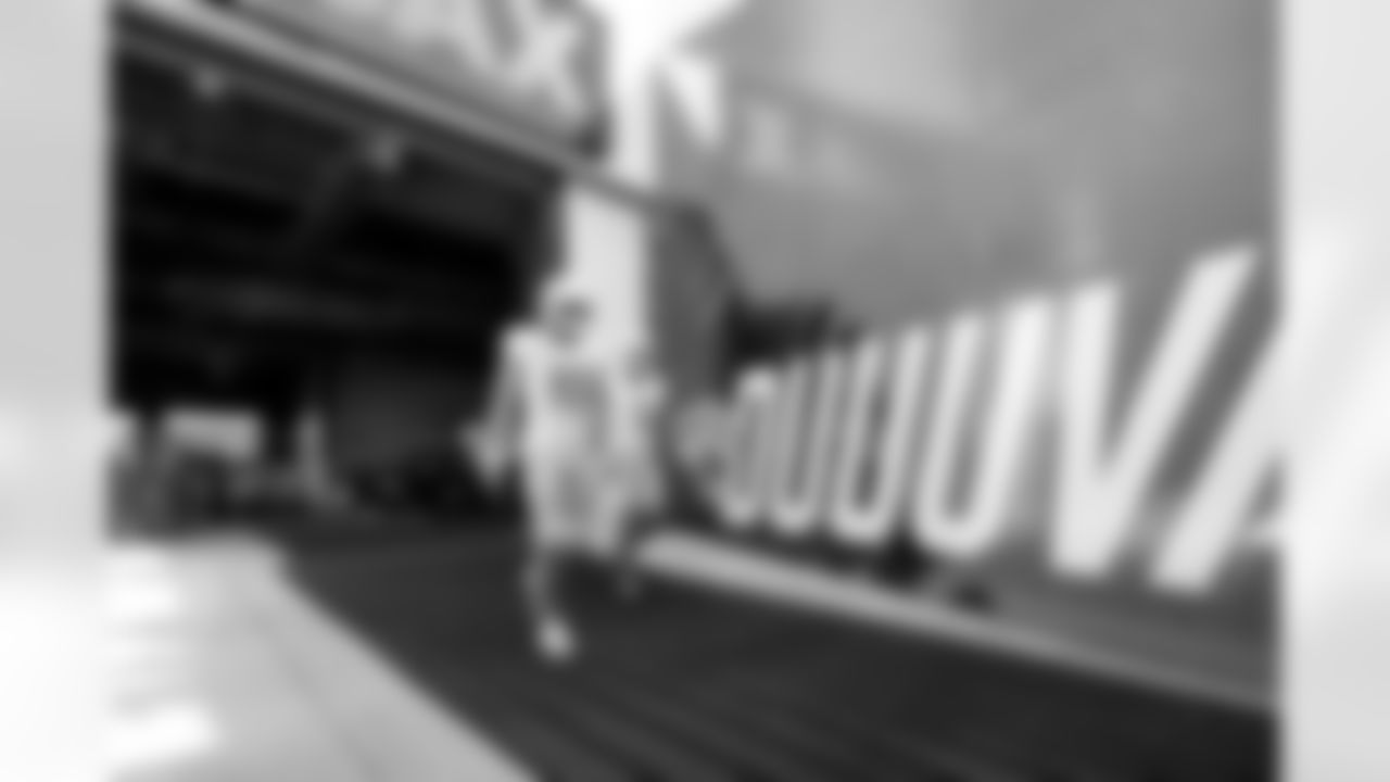 QB Justin Herbert (10) and QB Trey Lance (5)