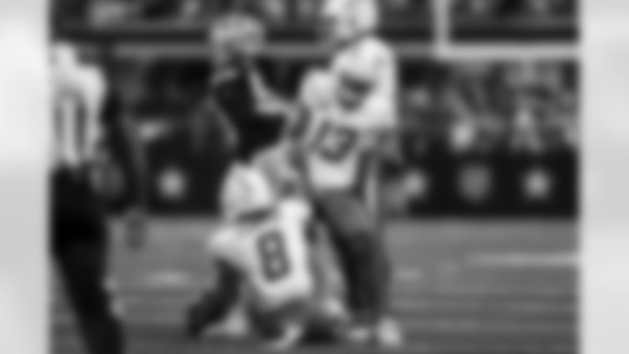 RB Omarion Hampton (8) and WR Keenan Allen (13)