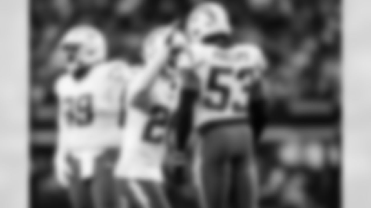 CB Donte Jackson (26) and LB Del'Shawn Phillips (53)