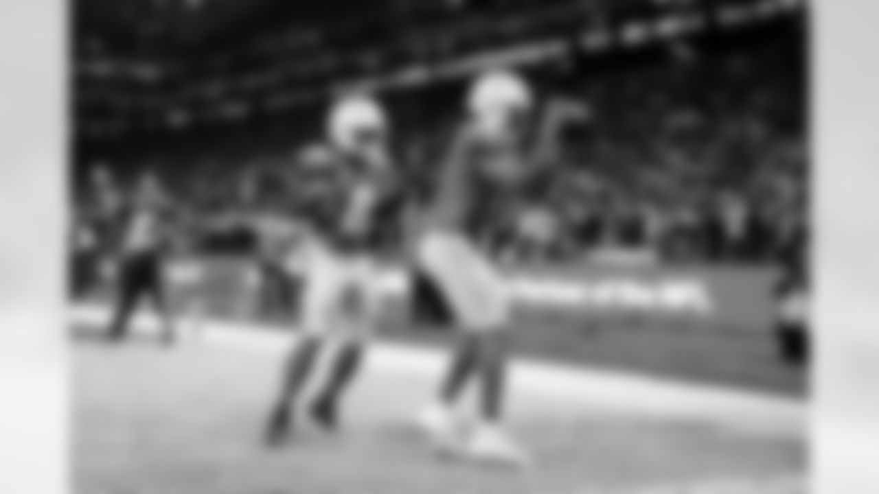 RB Omarion Hampton (8) and WR Quentin Johnston (1)