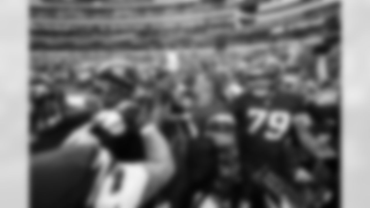 DL Justin Eboigbe (92), T Trey Pipkins III (79) and OLB Khalil Mack (52)