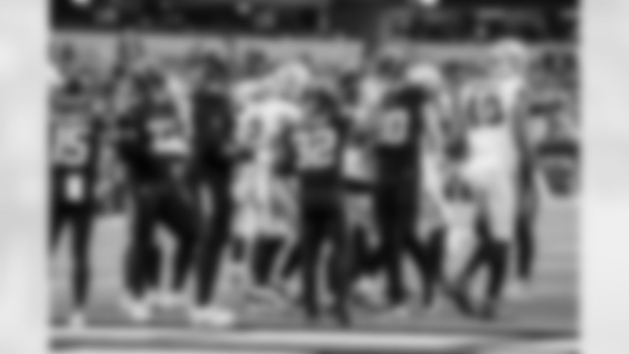 RB Jaret Patterson (32) and QB Justin Herbert (10)