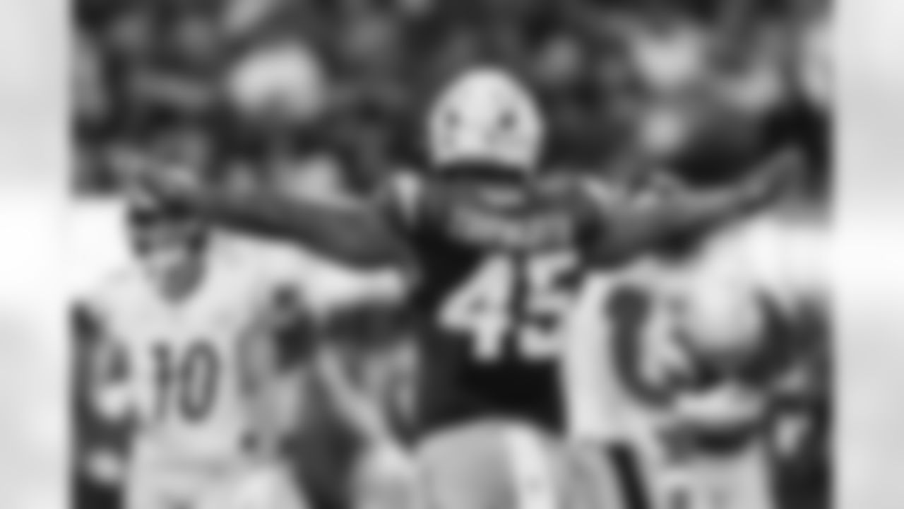 Chargers OLB Tuli Tuipulotu (#45) in action during their Pro Bowl season.