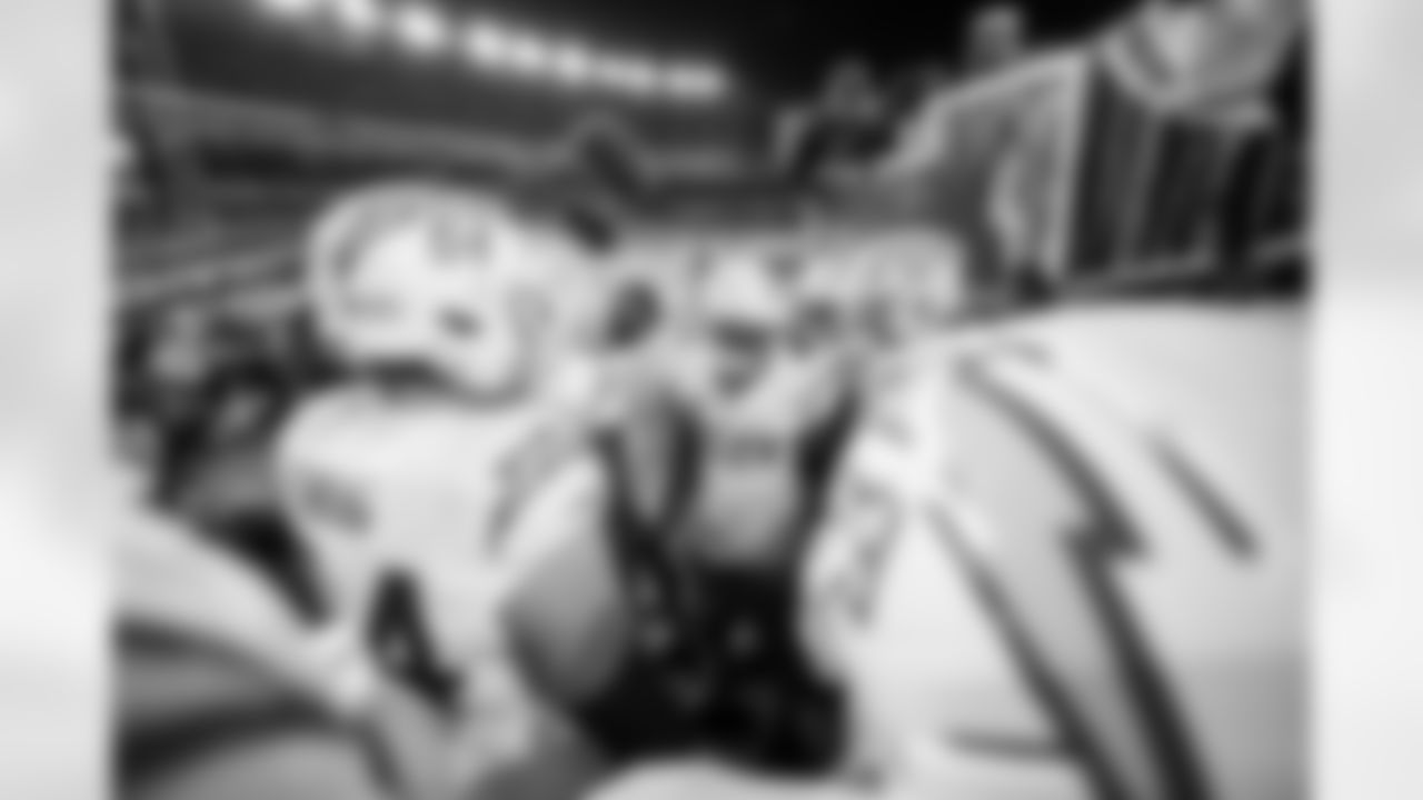 OL Trevor Penning (64), OLB Khalil Mack (52) and T Trey Pipkins III (79)