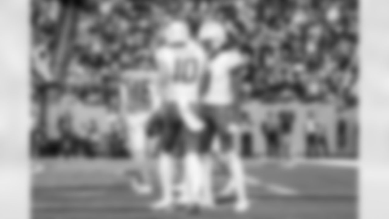 QB Justin Herbert (10) and WR Quentin Johnston (1)