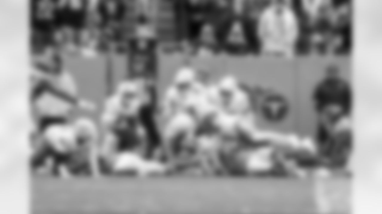 DB Elijah Molden (2), DL Justin Eboigbe (92) and OLB Khalil Mack (52)