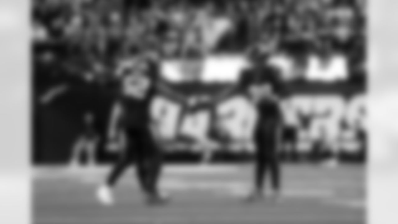 OLB Khalil Mack (52) and OLB Odafe Oweh (98)