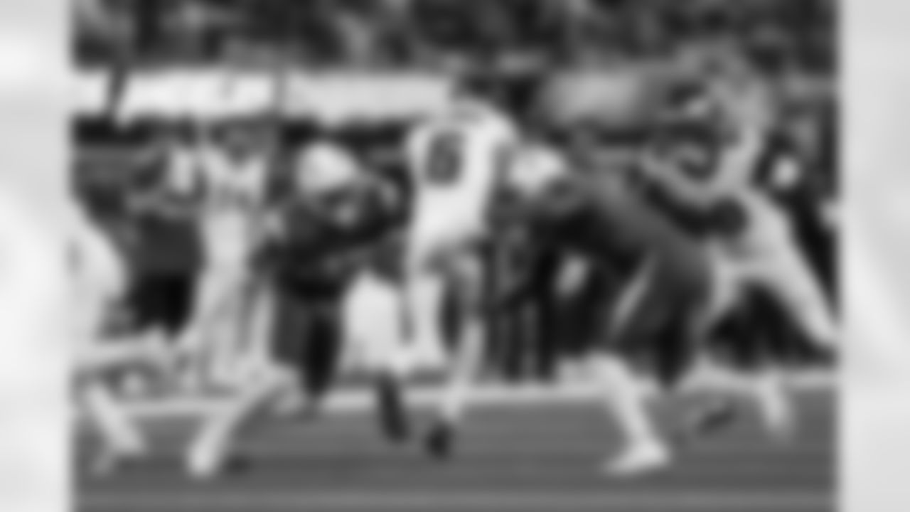 S RJ Mickens (27) and LB Denzel Perryman (6)