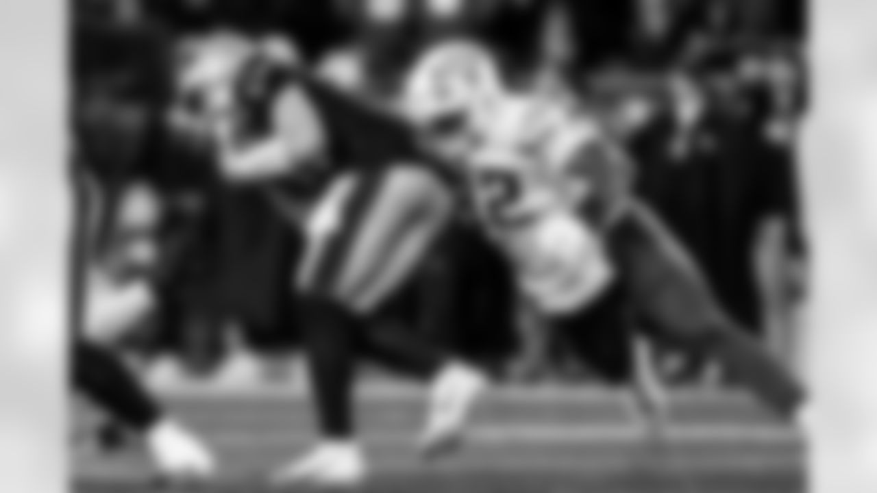 Check out the best shots from the Chargers Wild Card matchup against the Patriots!