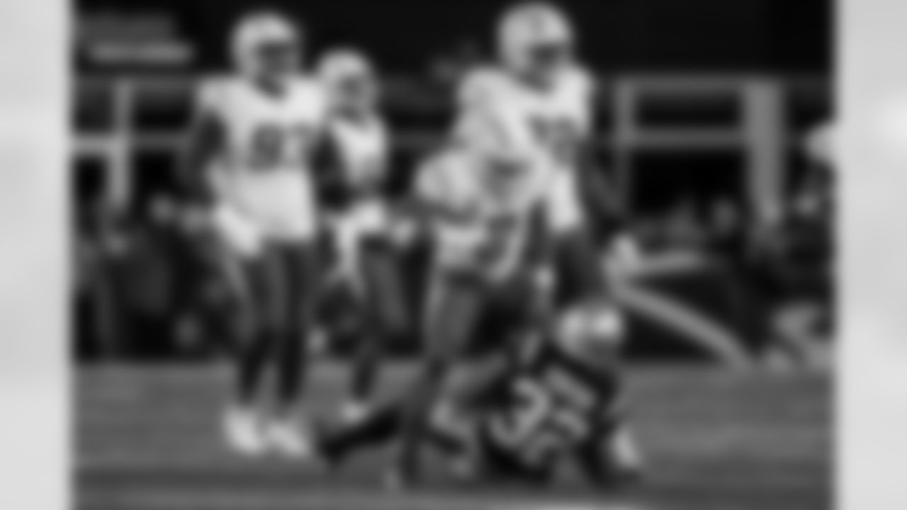 Check out the best shots from the Chargers Wild Card matchup against the Patriots!