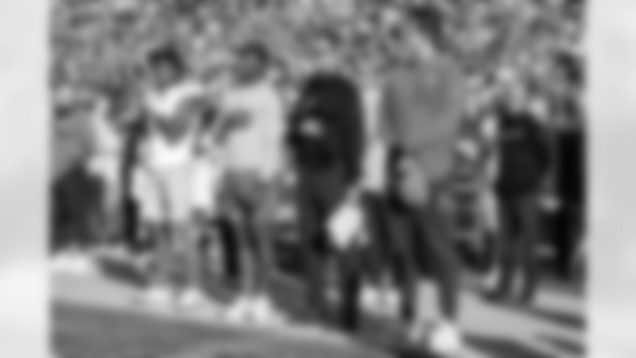 LB Daiyan Henley (0), S Derwin James Jr. (3), Head Coach Jim Harbaugh and QB Justin Herbert (10)