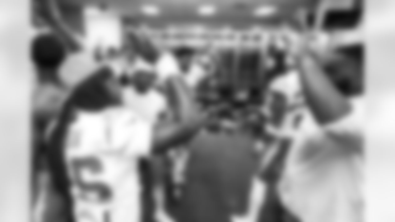 DT Jamaree Caldwell (99) and CB Donte Jackson (26)