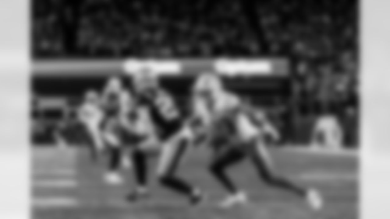 Check out the best shots from the Chargers Wild Card matchup against the Patriots!