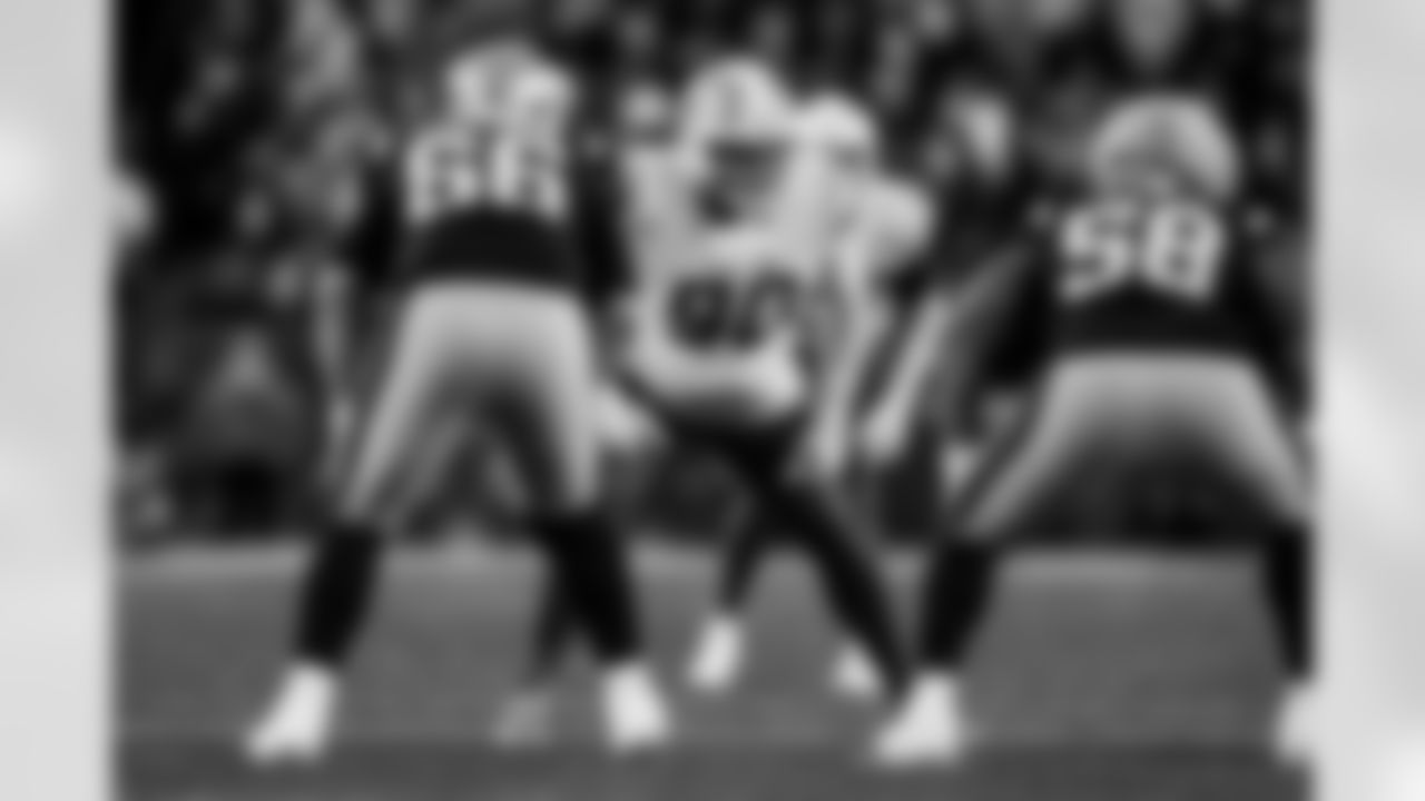 Check out the best shots from the Chargers Wild Card matchup against the Patriots!