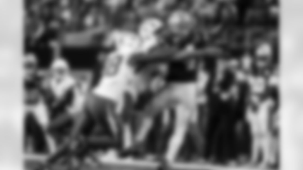 OLB Odafe Oweh (98) and OLB Tuli Tuipulotu (45)