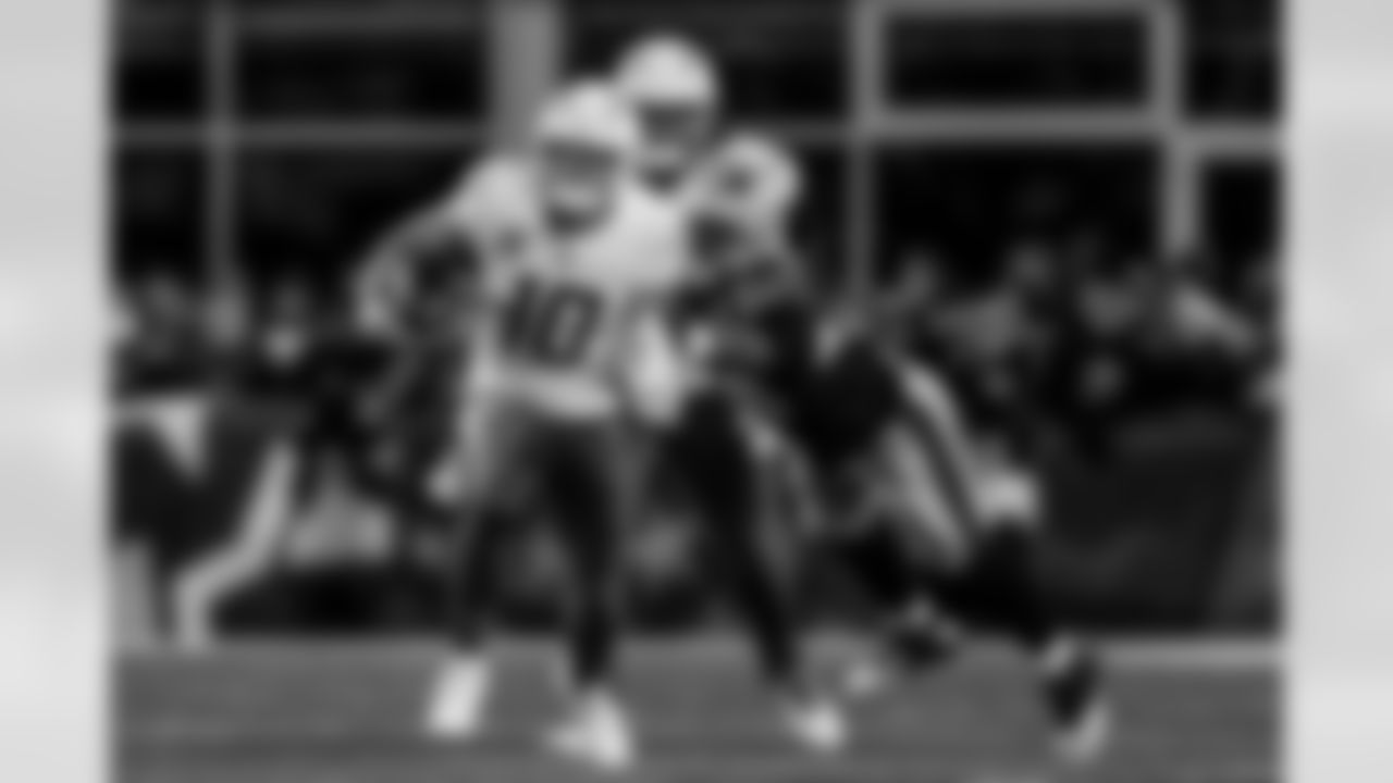 Check out the best shots from the Chargers Wild Card matchup against the Patriots!