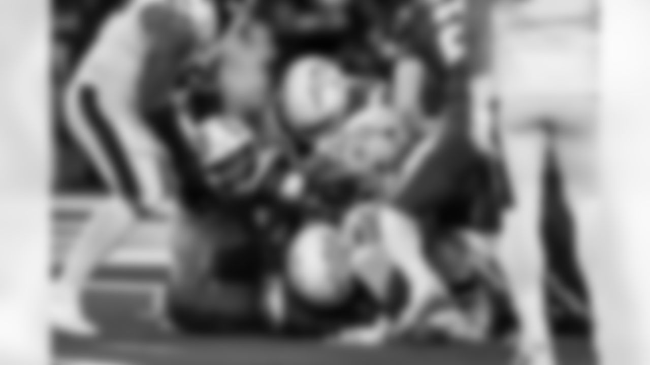 DL Teair Tart (90), OLB Khalil Mack (52), DL Da'Shawn Hand (91) and LB Denzel Perryman (6)