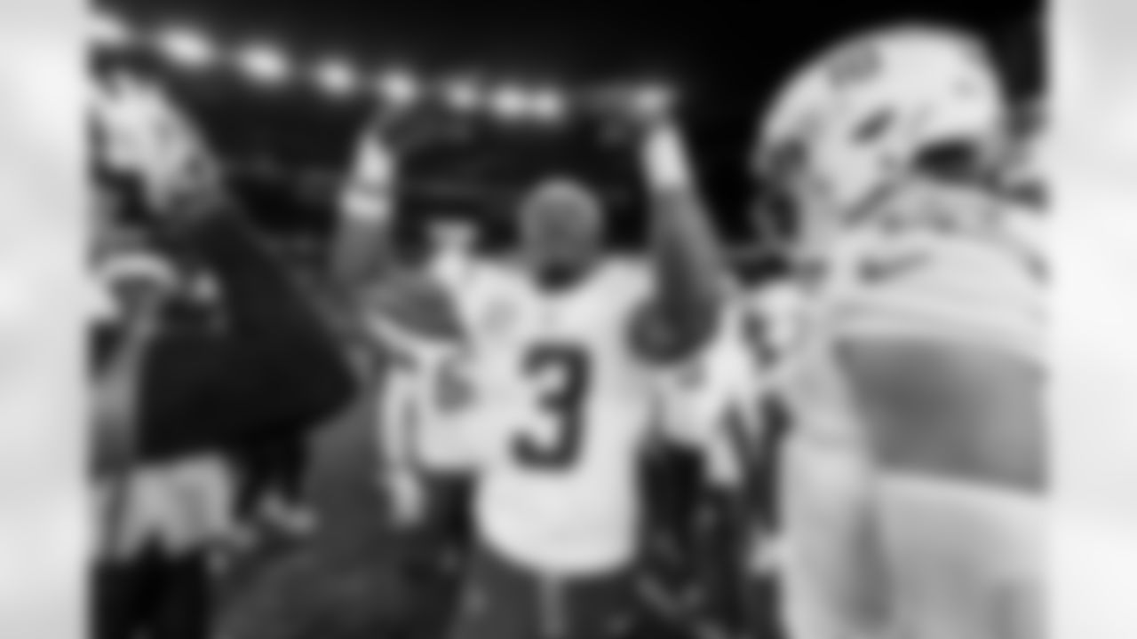 Check out the best shots from the Chargers Wild Card matchup against the Patriots!