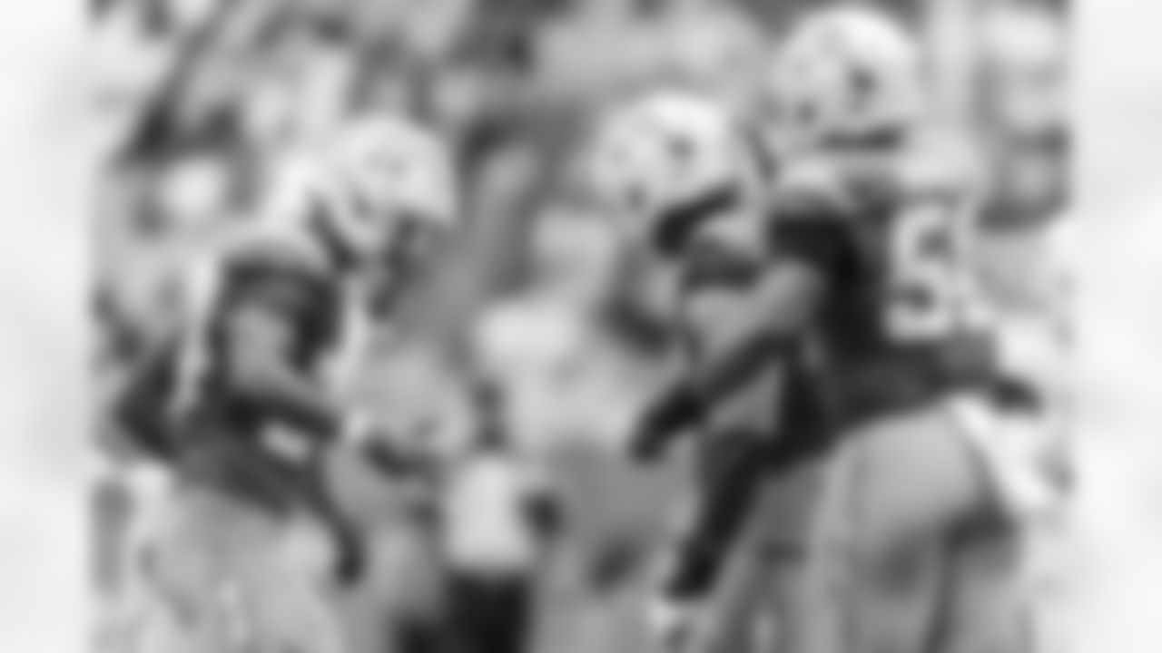 CB Benjamin St-Juste (24), DL Justin Eboigbe (92) and OLB Caleb Murphy (50)